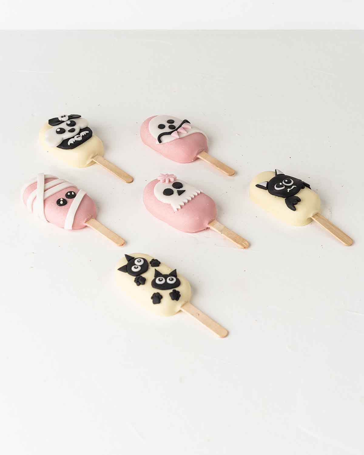 Pink and White Halloween Cakesicles